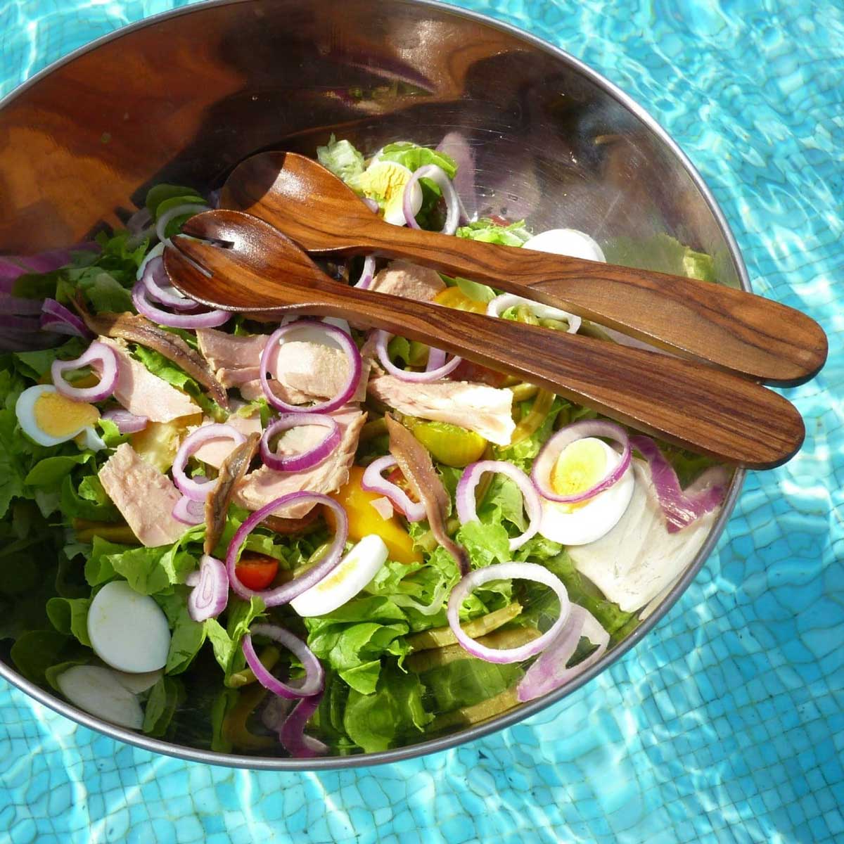 nicoise salad on a floating bowl