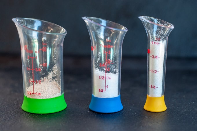 Sugar Salt and yeast in measurement containers