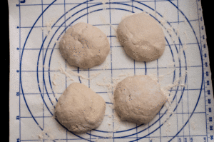 cut the dough into 4 equal sizes