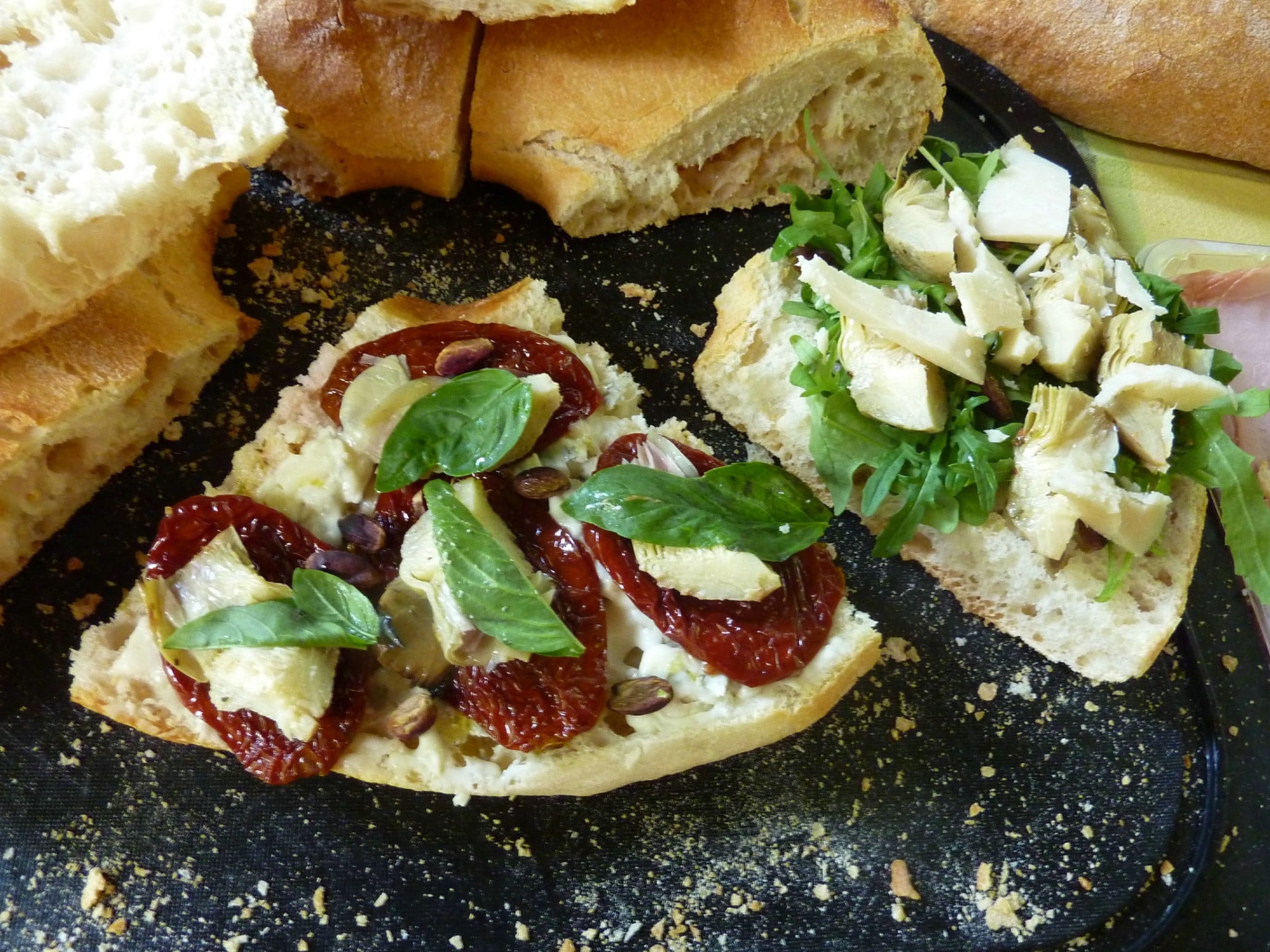 Vegeterian Panino dolcelatte sliced artichoke hearts sun kissed tomatoes basil pistachios
