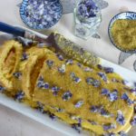swiss roll sponge homemade crystallised violets butter cream and pistachios