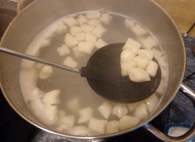 cooking the homemade gnocchi