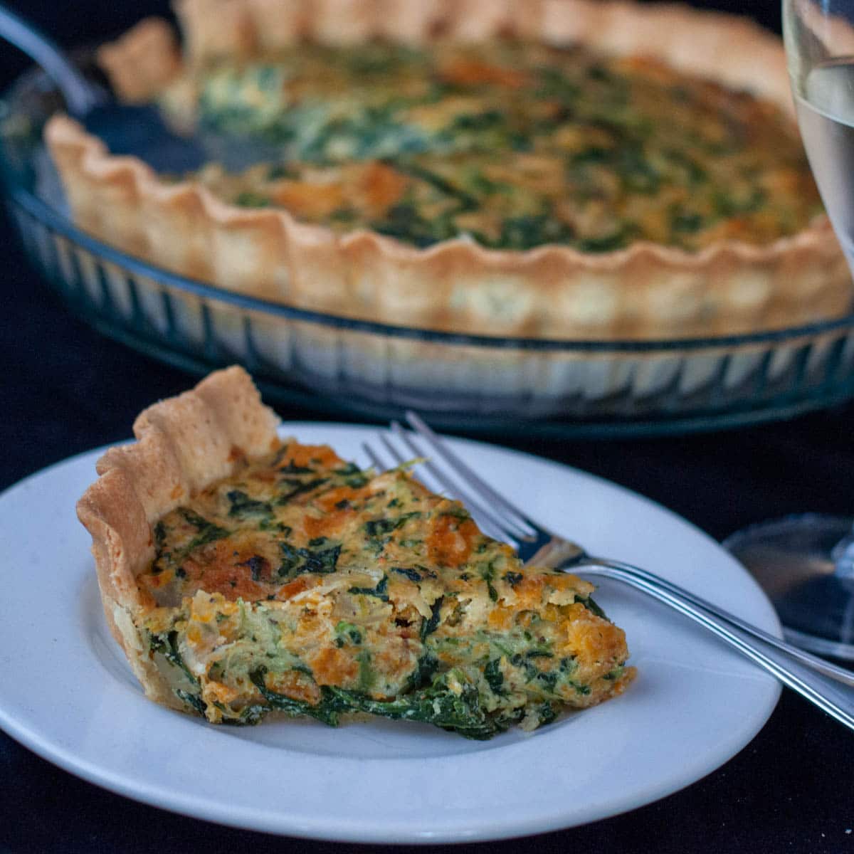 Italian Spinach Ricotta Pie With Caramelized Squash slice served on a plate