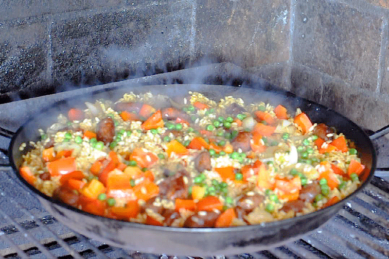 Seafood paella cooked on the bbq