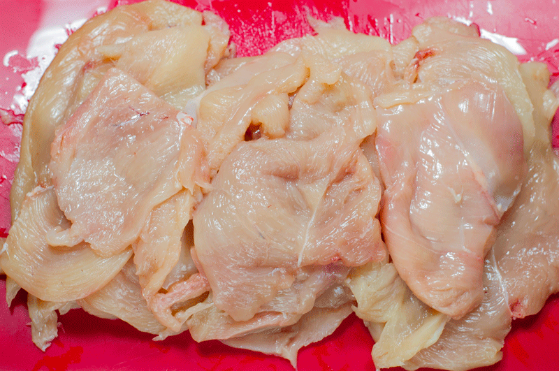 Cut the chicken breast in slices