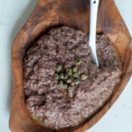 Tapenade is an olive paste usually served over some crostini bread or bruschette. It is a mix of black olives, anchovies, garlic, capers, thyme, lemon juice and extra-virgin olive oil. #yourguardianchef #dip #spread