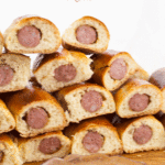 Usually, sausage rolls recipe call for puff pastry, while this recipe uses homemade brioche dough. The sweet dough nicely contrasts the saltiness of the sausages and a spicy mustard adds a little kick to each bite #yourguardianchef #rolls #sausage