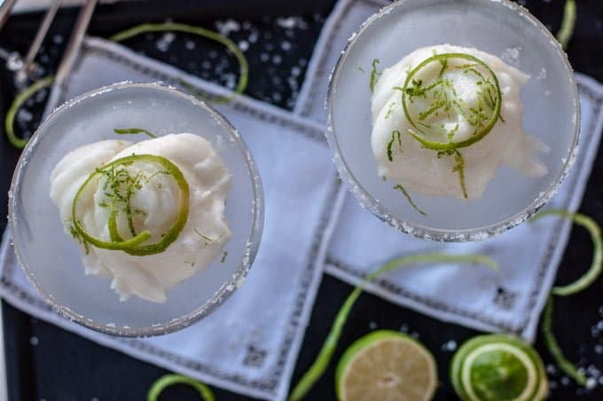 View from the top of the margetita glasses with sorbet decorated with lime zest