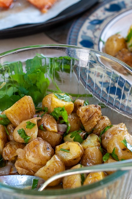 Italian potato salad in a bowl vertical photo
