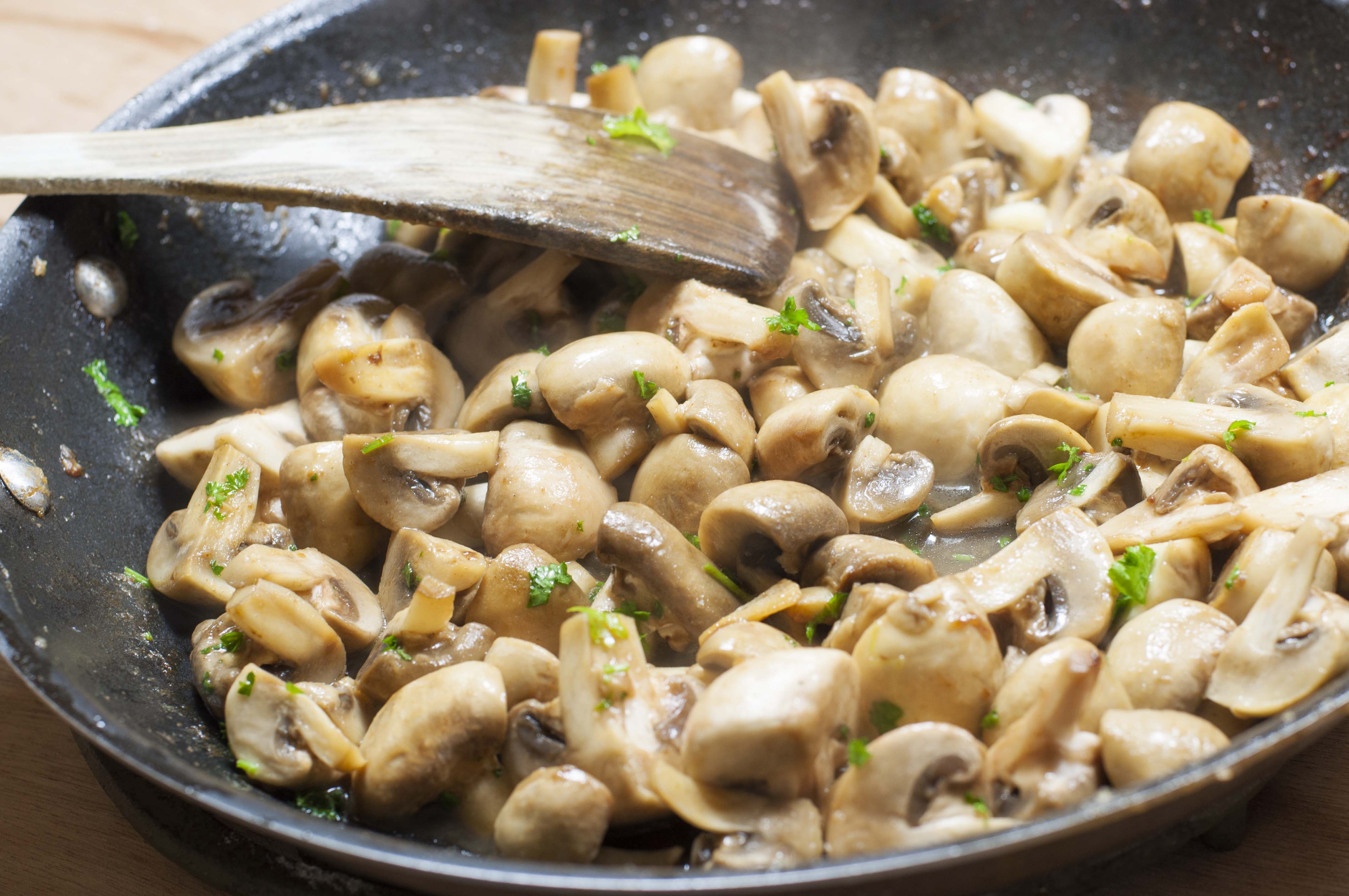 Stir fry the mushrooms with garlic