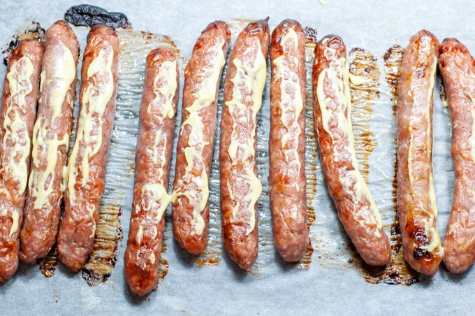 sausages covered with mustard