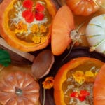 This roasted pumpkin soup is what you need for a special celebration, the soup is full of hearty flavours, like garlic and thyme. To make it festive it is served inside the pumpkin and top it with peppery edible flowers Nasturtium Capucines.