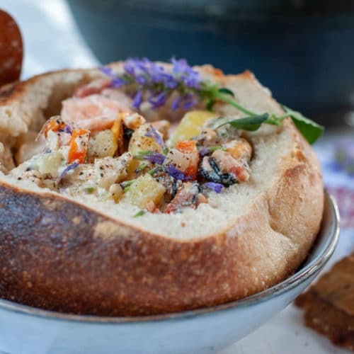 seafood chowder recipe served in a bread bowl