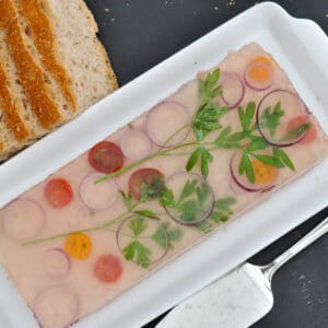 Ham Hock Terrine on a tray served with bread