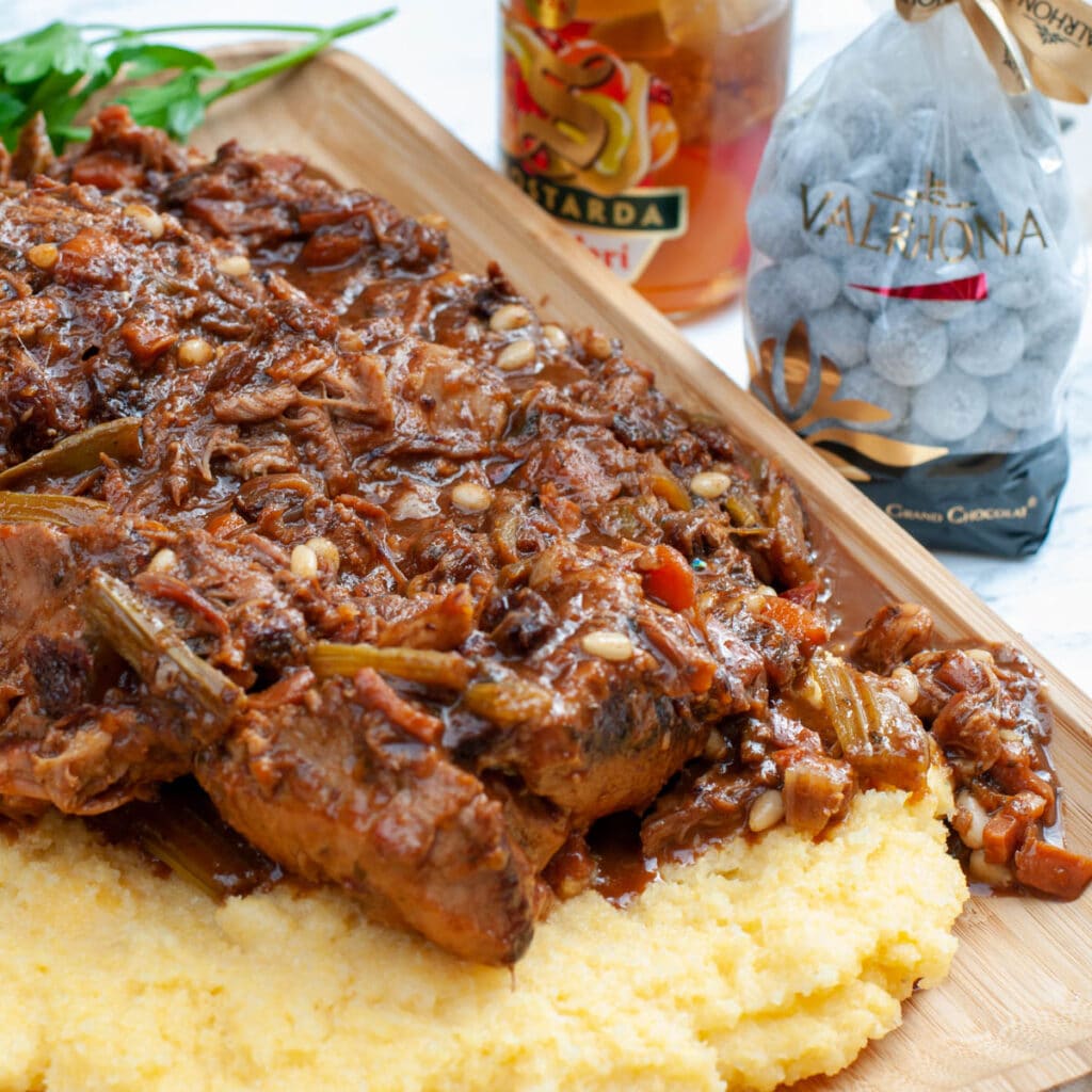 Wild Boar Meat Stew With Rich Spicy Chocolate Sauce served with polenta