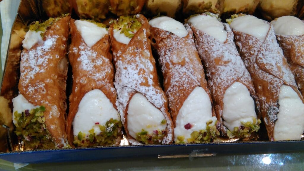 Large cannoli from a Sicilian bakery