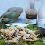 This Italian artichoke salad is made with raw spiky artichokes, they are in season during the fall/winter. They are so tender, you don't need to cook them. Mixed with a fresh salad, topped with Parmesan flakes, and simply seasoned with salt, extra virgin olive oil and "real" balsamic vinegar.