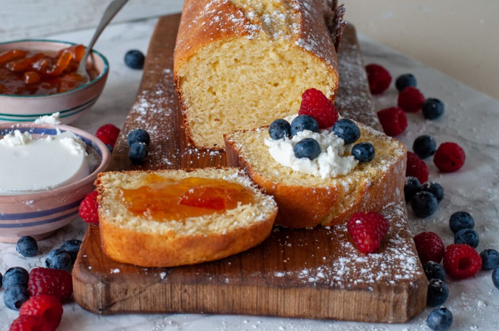 slices of healthy ricotta cake served with berries or jam