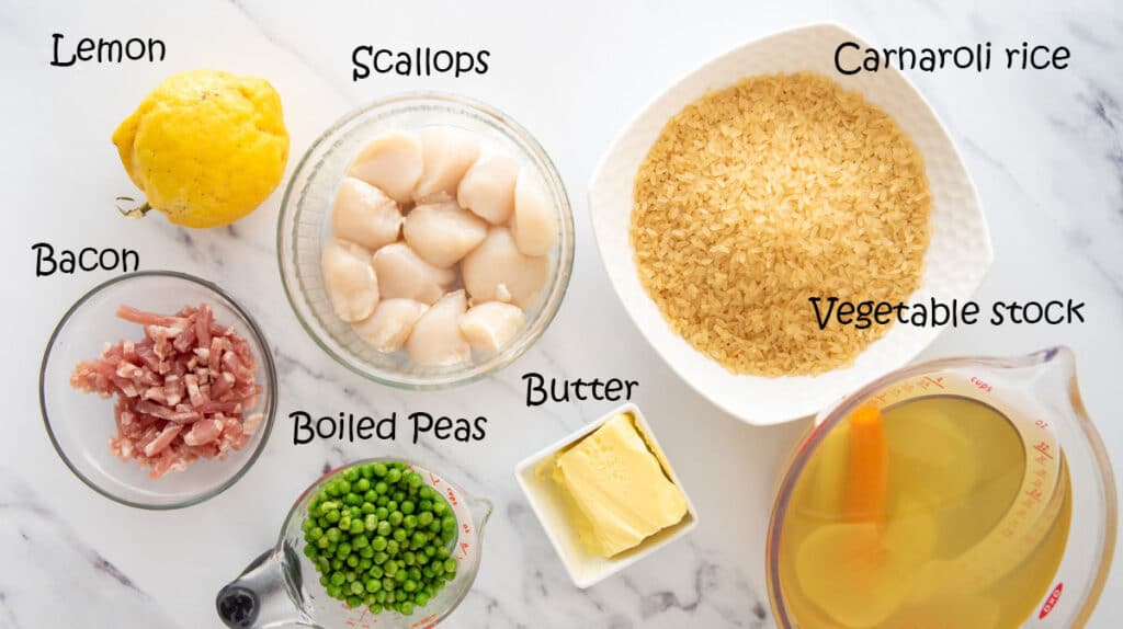 Ingredients to make scallops and risotto with peas and bacon