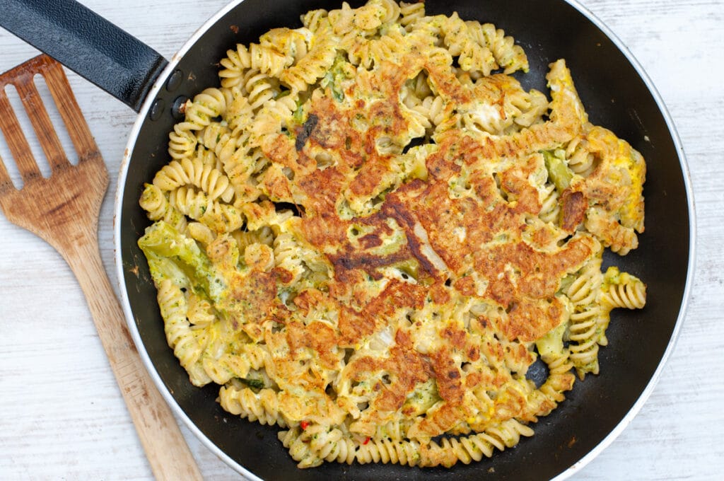 Different type of fried pasta, fusilli with broccoli