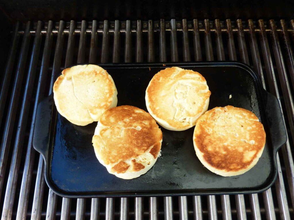 English muffins cooked on an outdoor barbecue grill