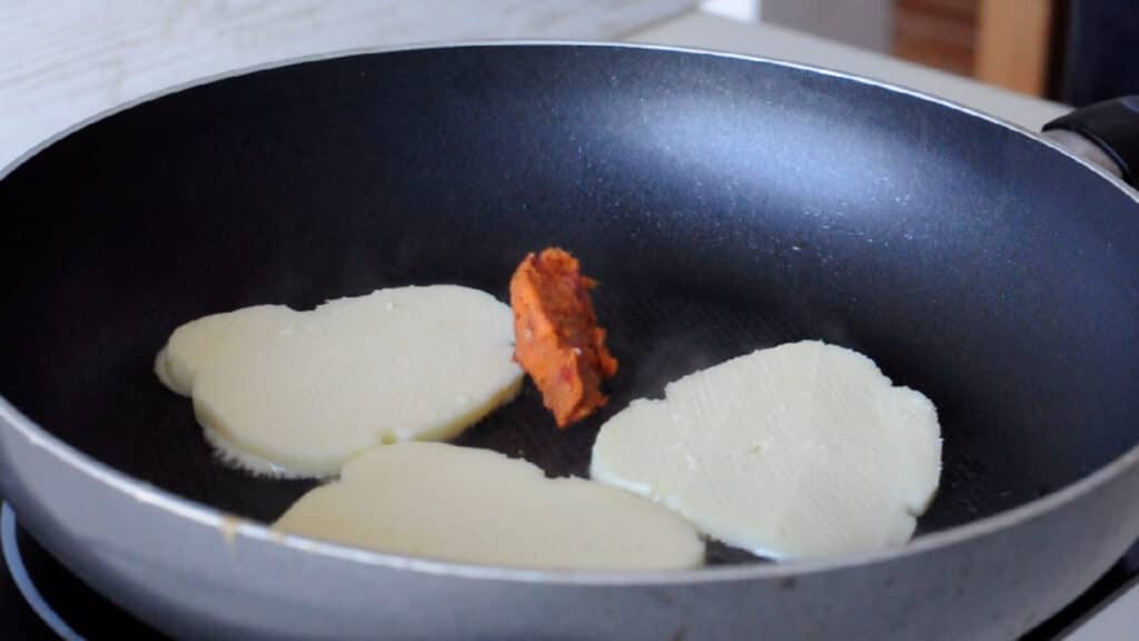 nduja and provola in a frying pan