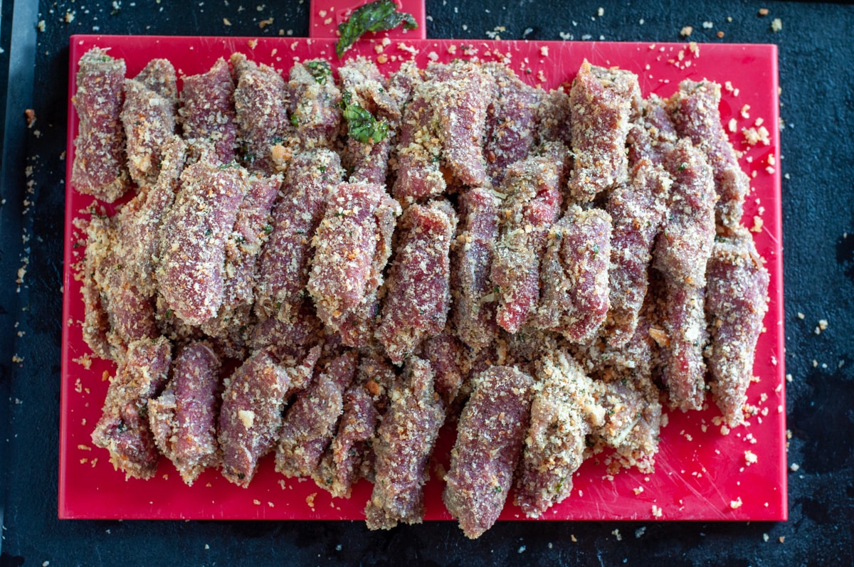 beef spiedini placed on a cutting board