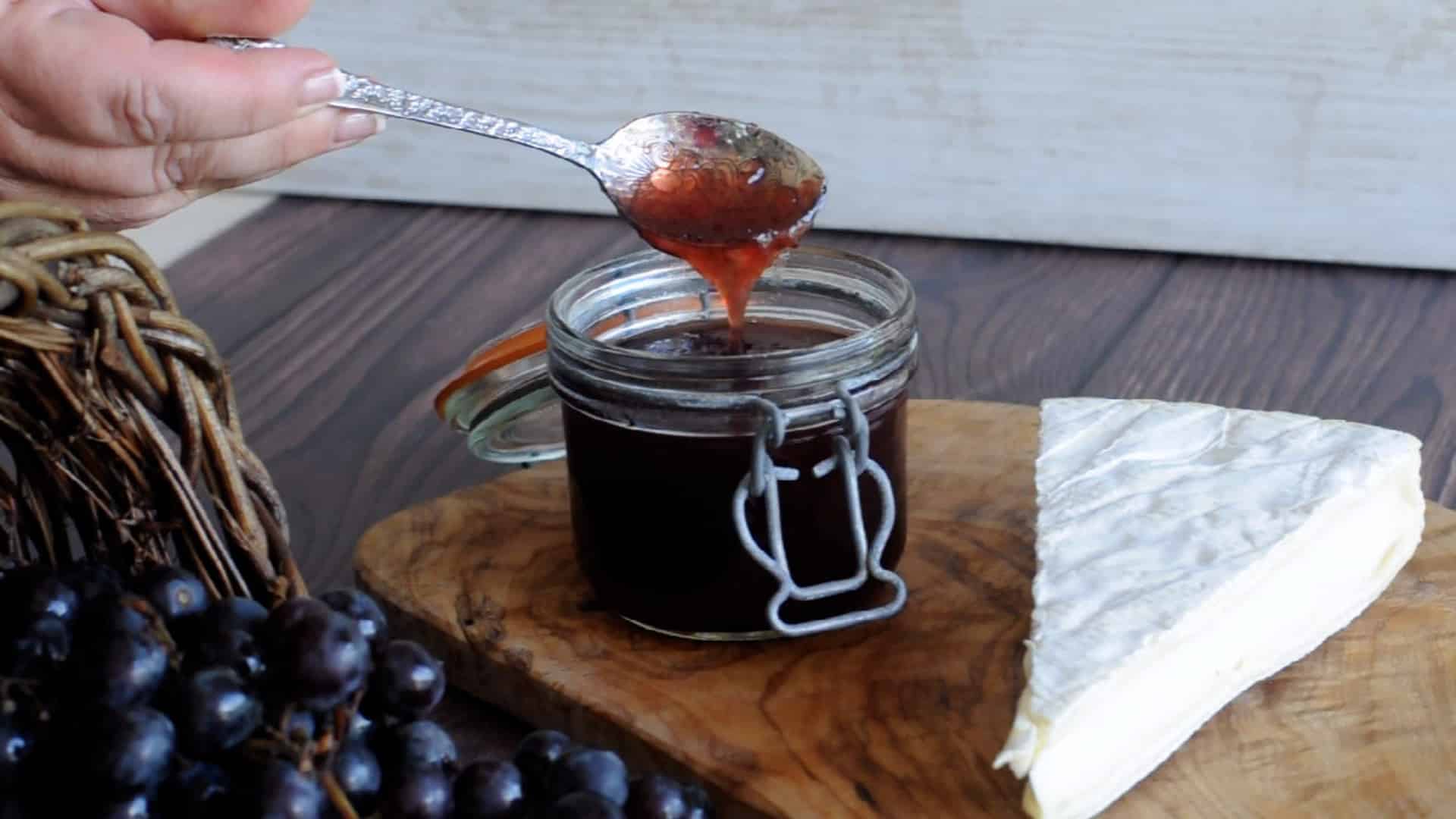 consistency of the grape jam dropping from a spoon