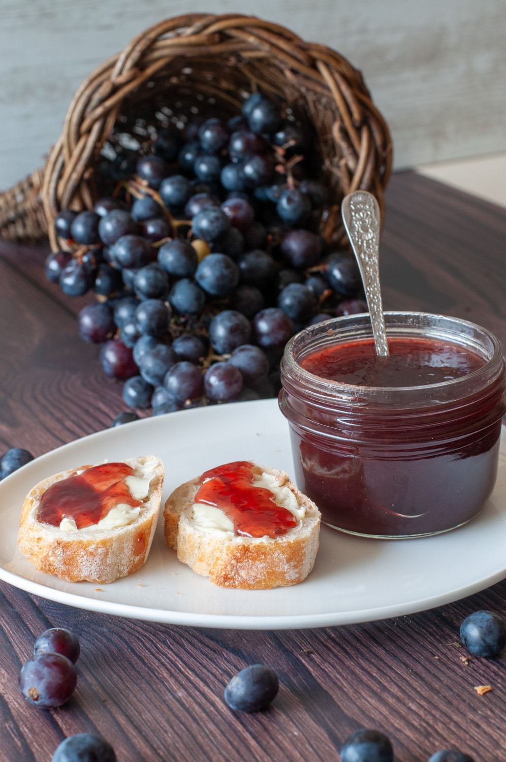 Eating the grape jam with bread and butter