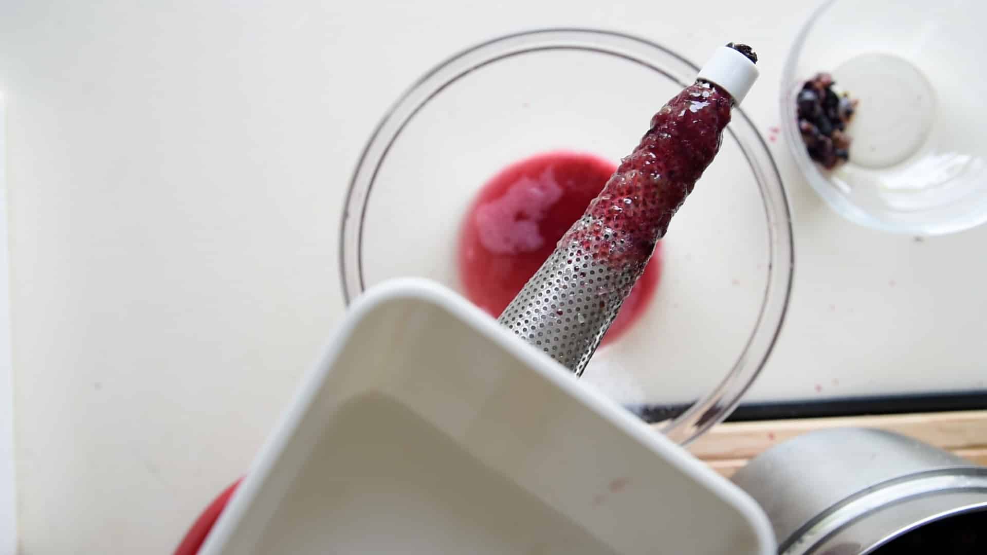 Pass the grapes through an electrical vegetable strainer