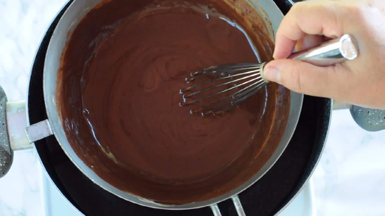 Mixing the chocolate with the cream