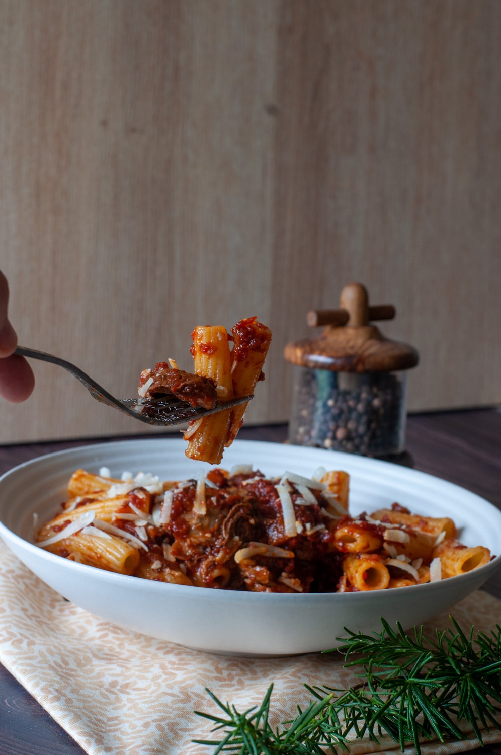 Lamb ragu with pasta on a fork