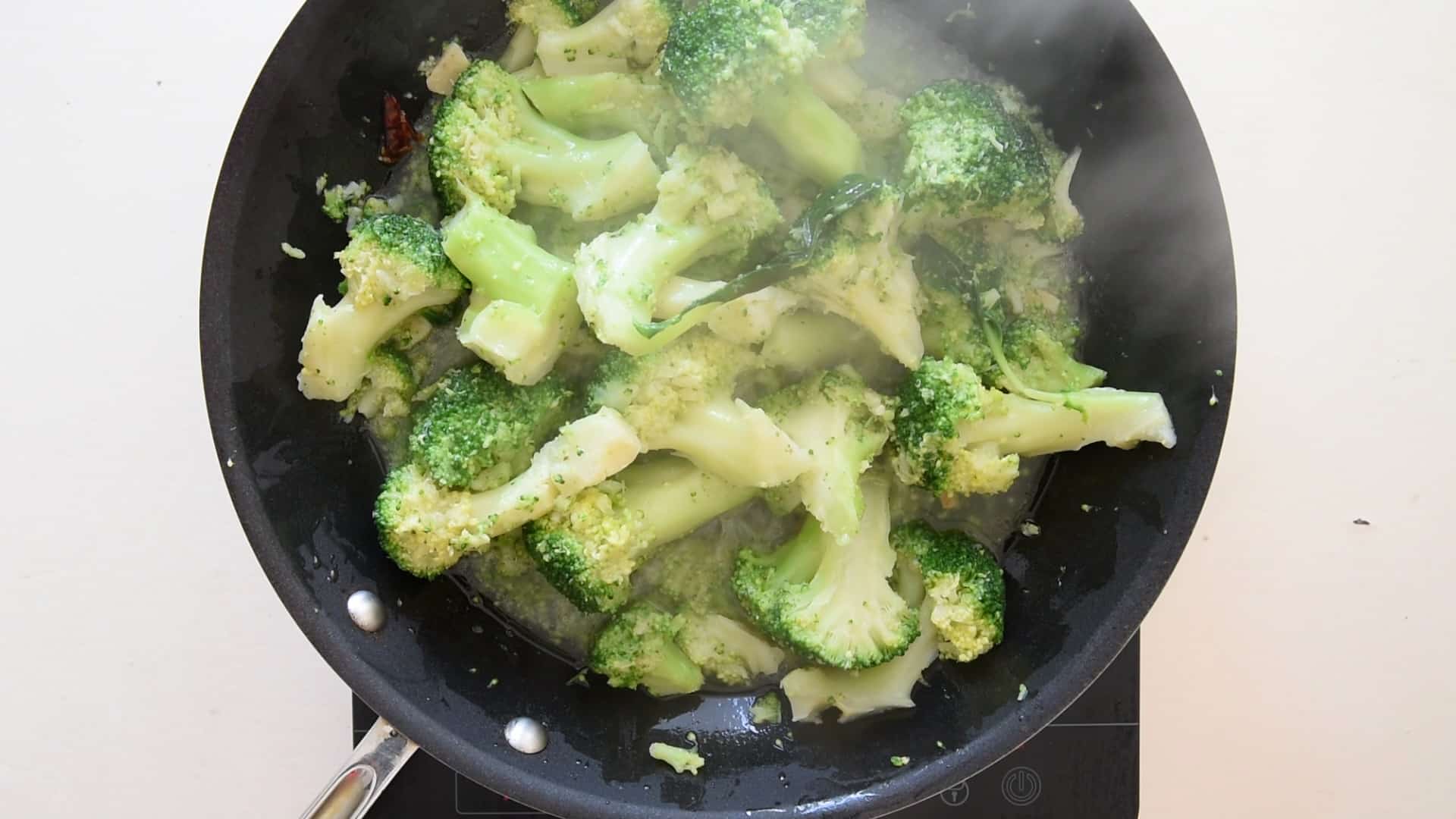 The smaller broccoli florets will break to form a sauce