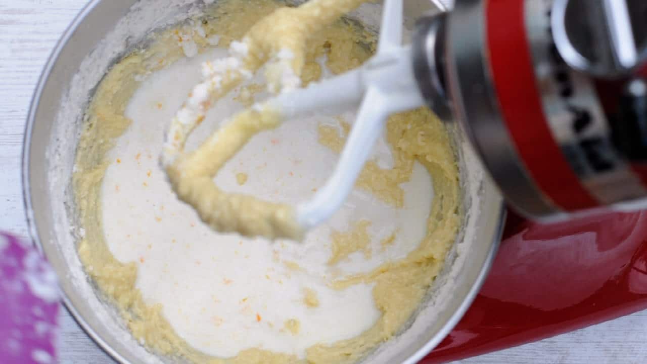 Adding the milk to the batter