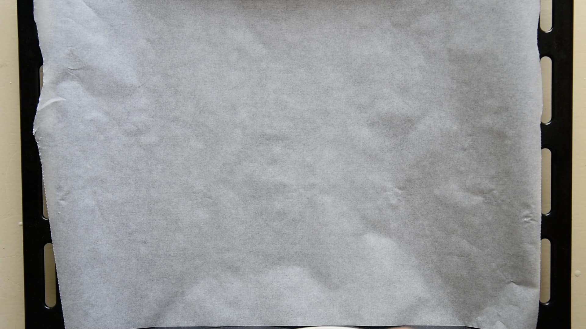 parchment paper over a baking pan