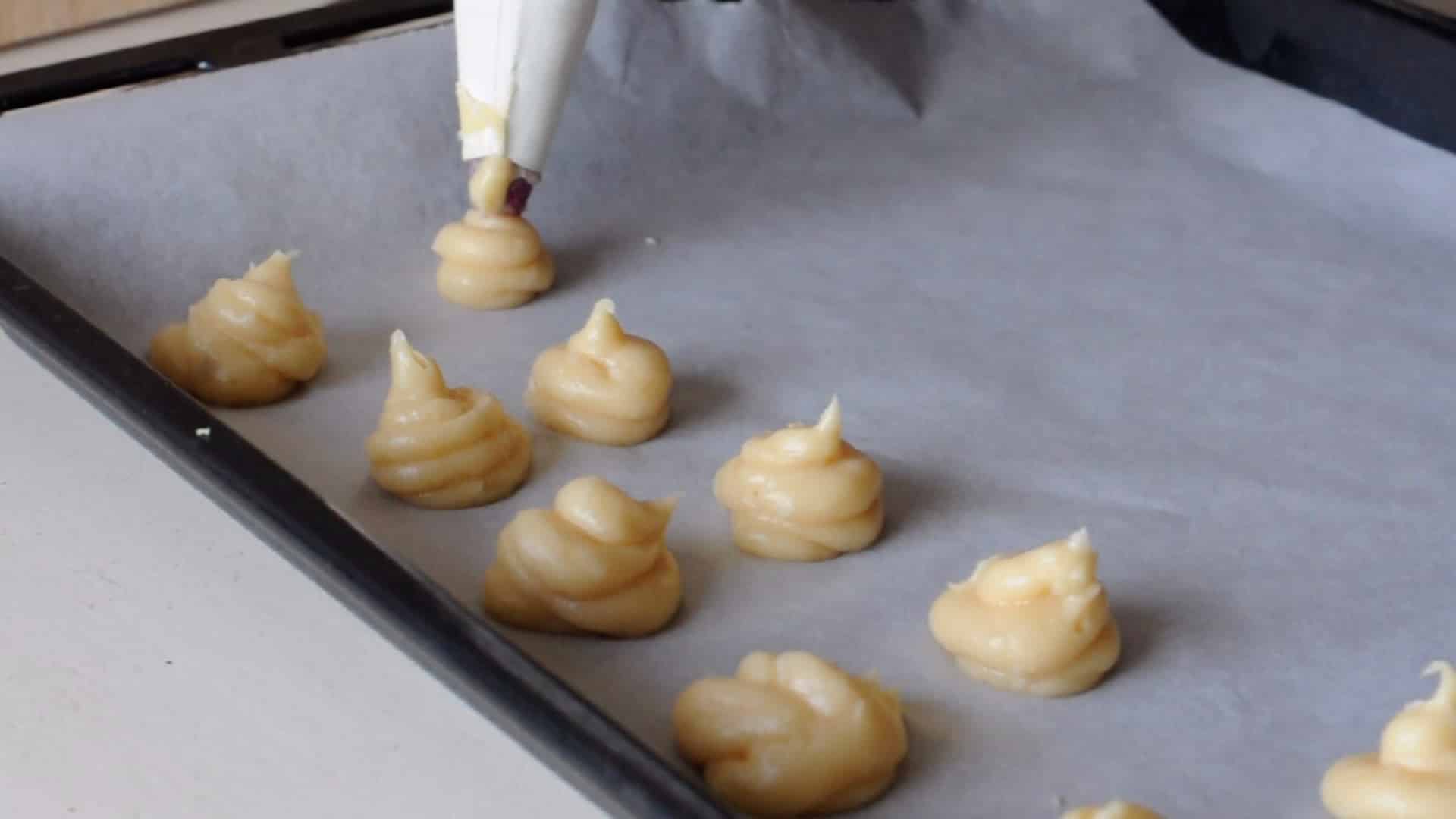 Piping the choux buns
