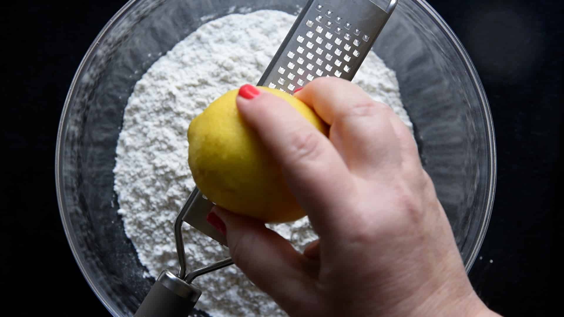 Adding lemon zest to the flour