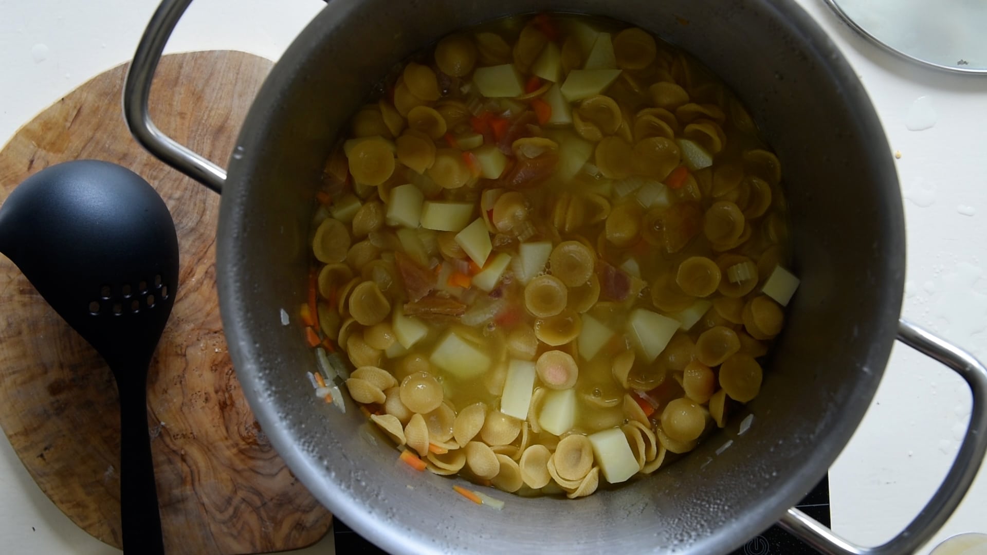 Add more stock to ALMOST cover the pasta, do not submerge it