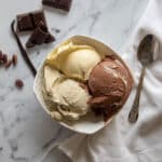 Italian gelato recipe vanilla, chocolate and pistachio balls in a serving bowl