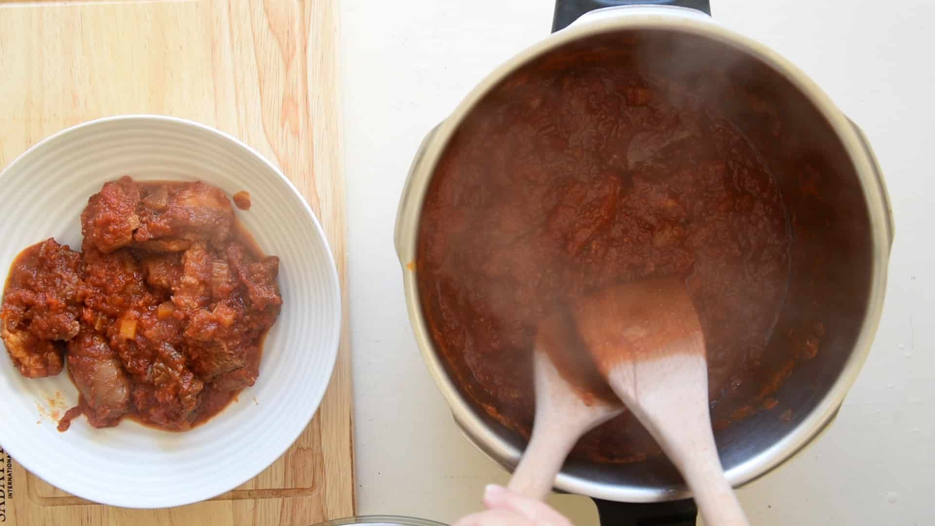 Remove the meat from the ragu