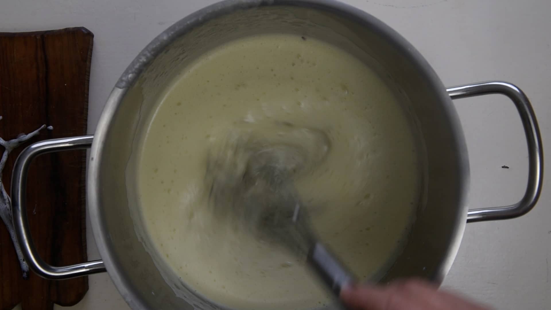 Add the pistachio paste and stir
