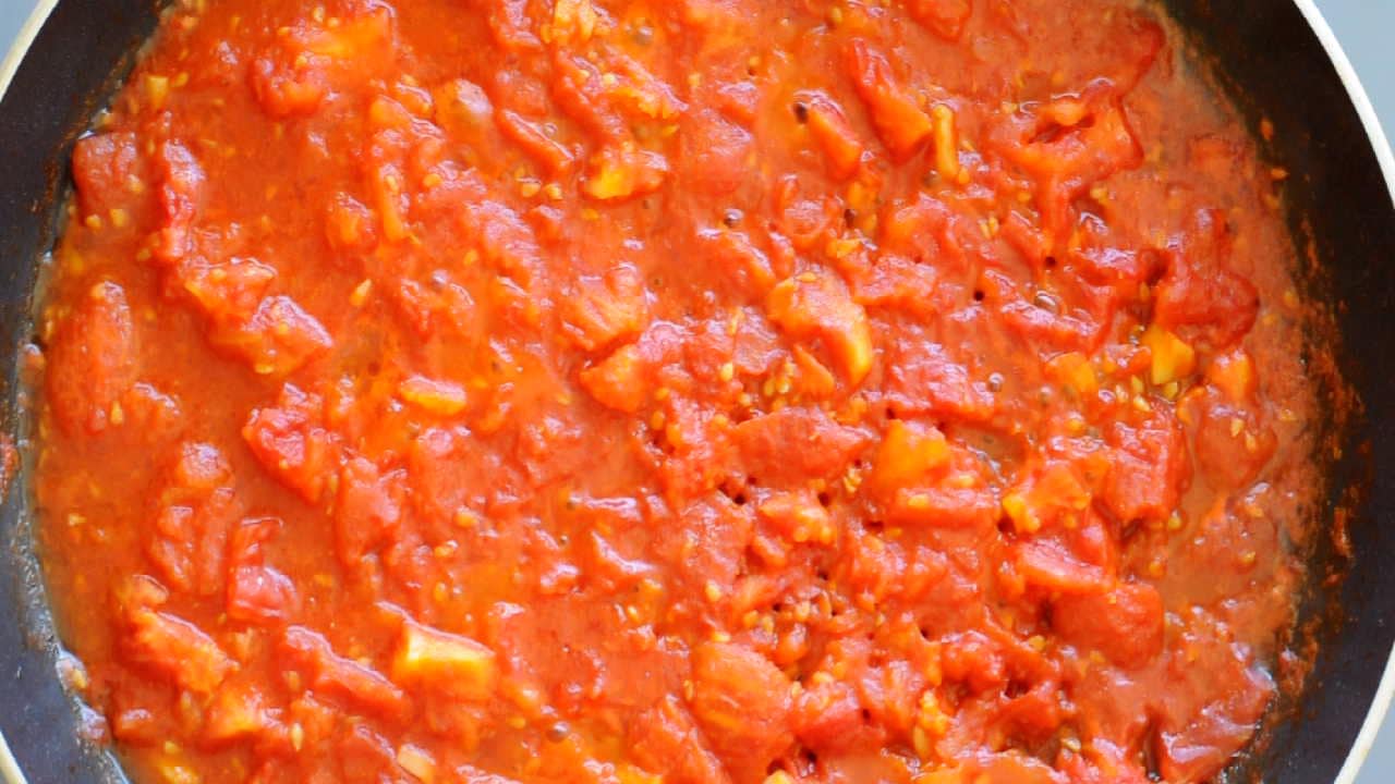 Simmer until the tomatoes melt into a sauce.