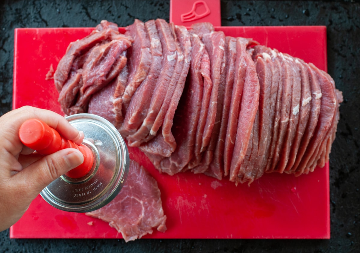 beef cut into thin slices and tenderized with a meat tenderizer