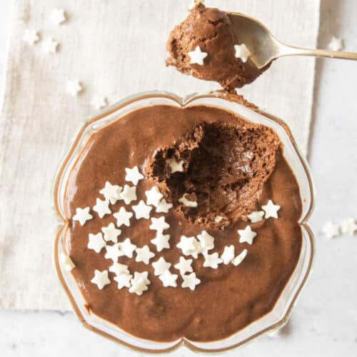 2 ingredients chocolate mousse decorated with sugar stars and a spoon