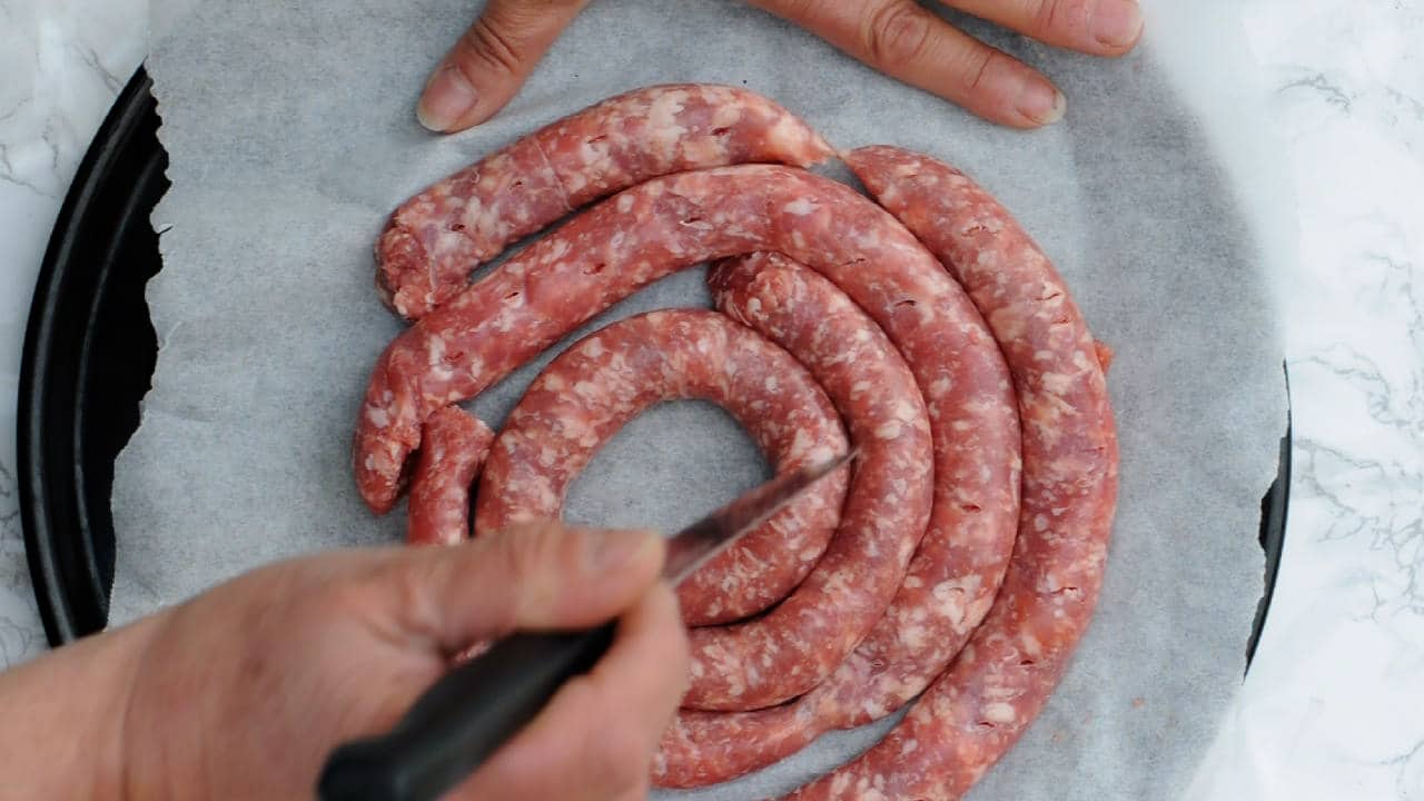 Poke the sausages