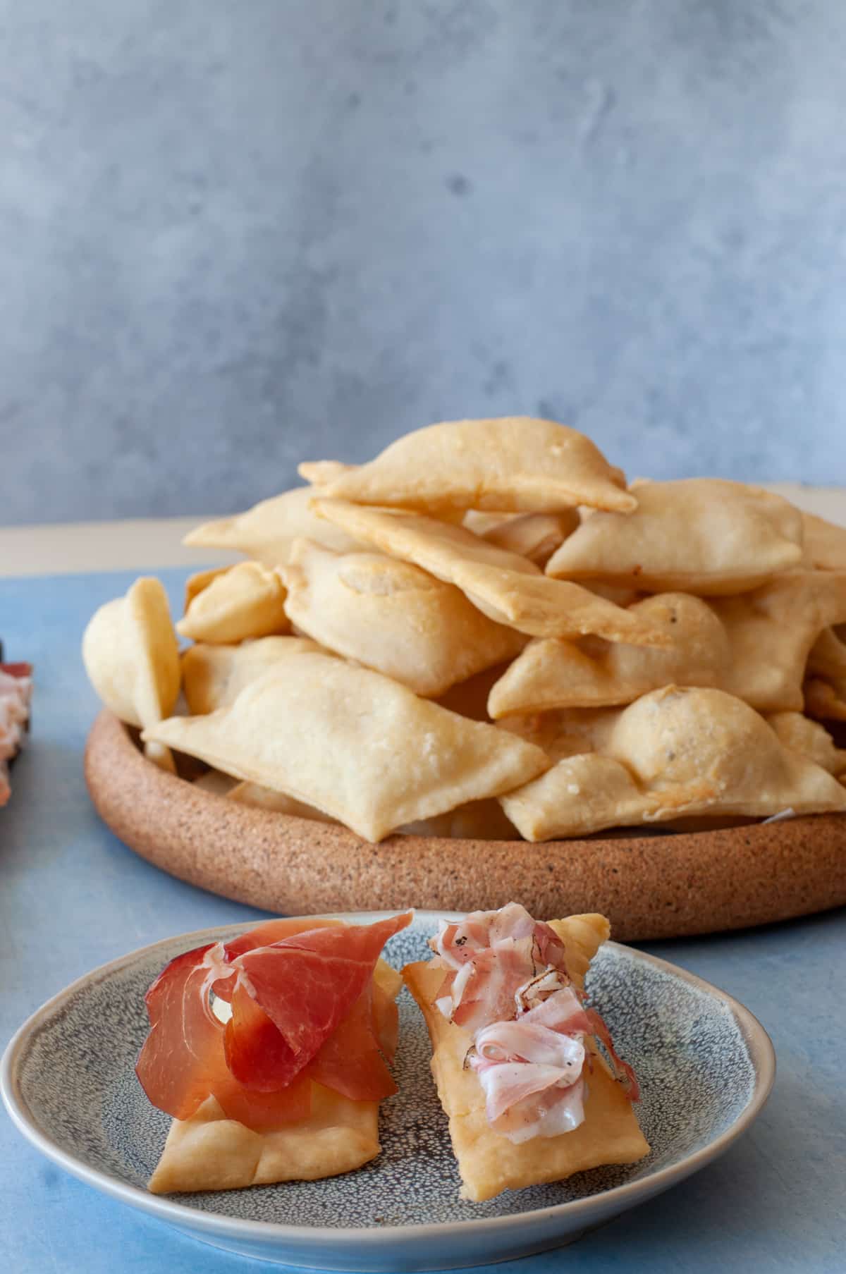 gnoccho fritto served with culatello and bacon