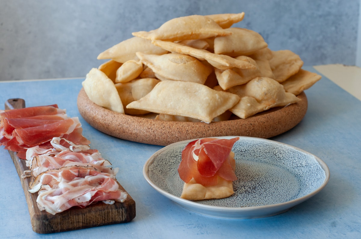 gnocco fritto served with cured meat