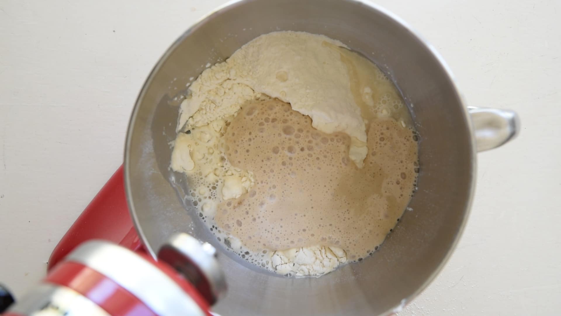 mix activated yeast with remaining flour and water
