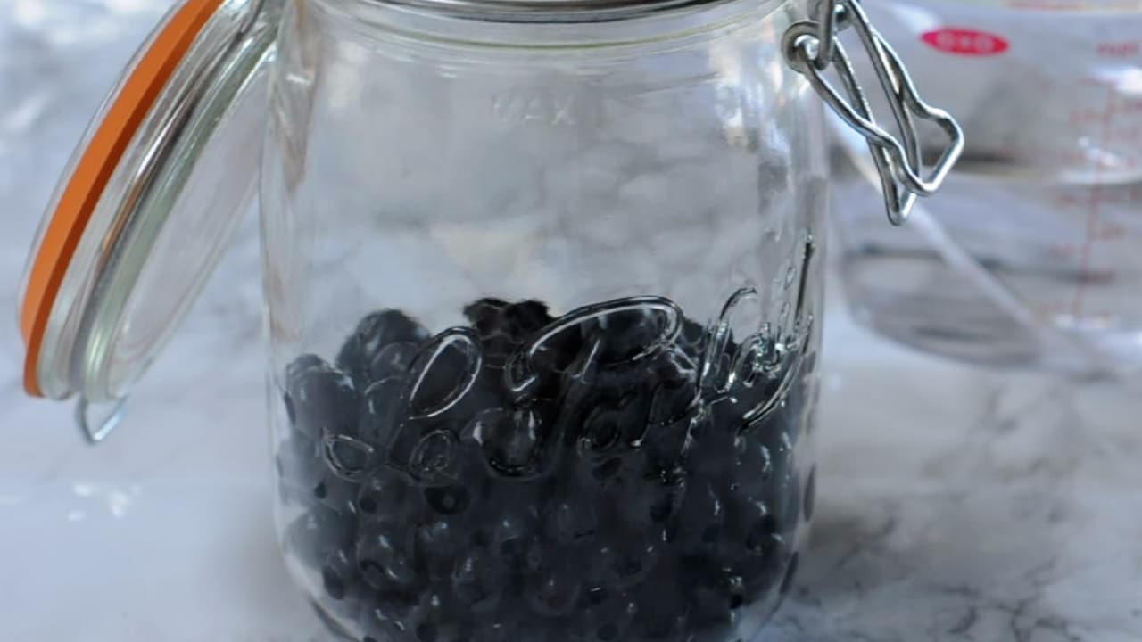place the blueberries in the jar