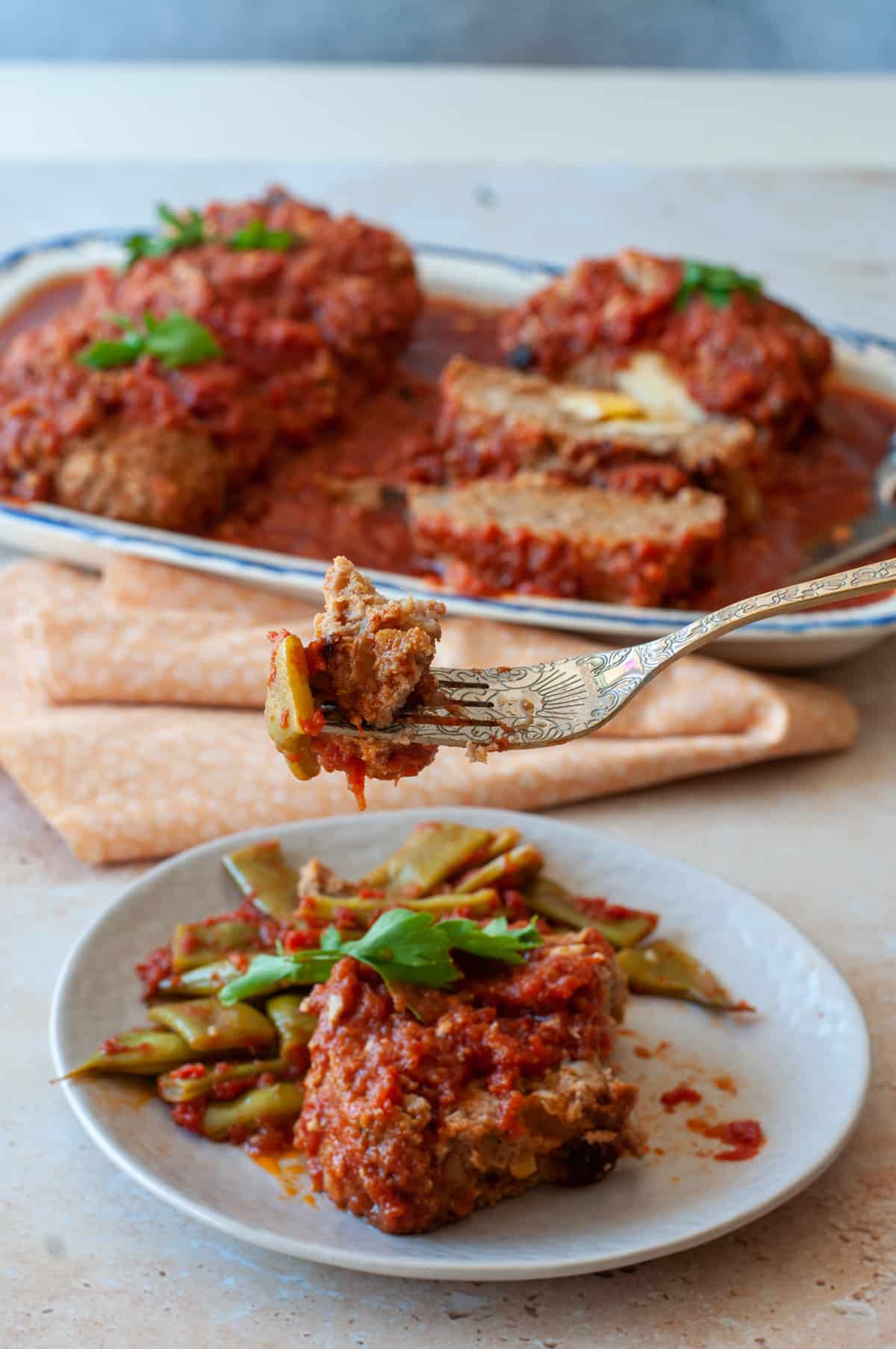 Italian meatloaf served with green beans